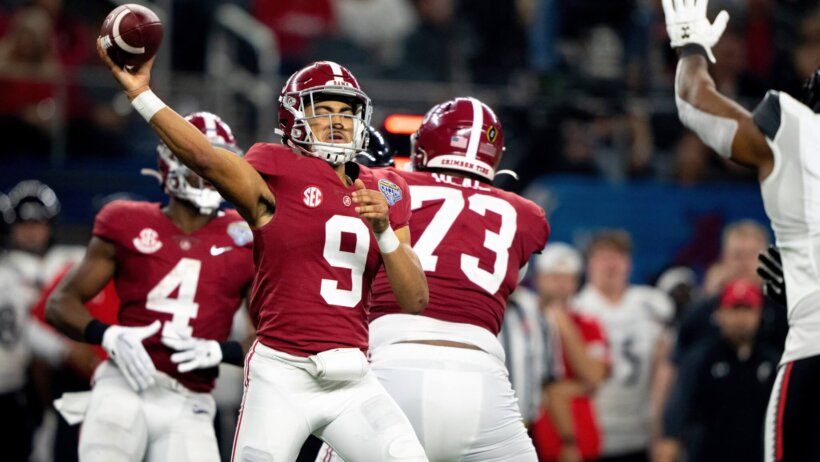 Alabama quarterback Bryce Young throws a pass