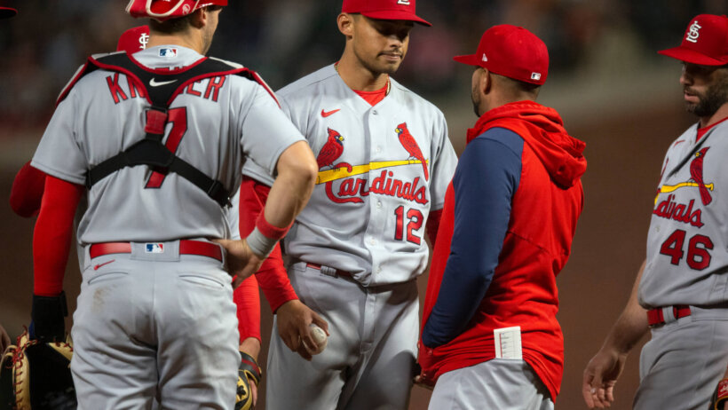 St. Louis Cardinals starting pitcher Jordan Hicks talking with manager Oliver Marmol on the mound