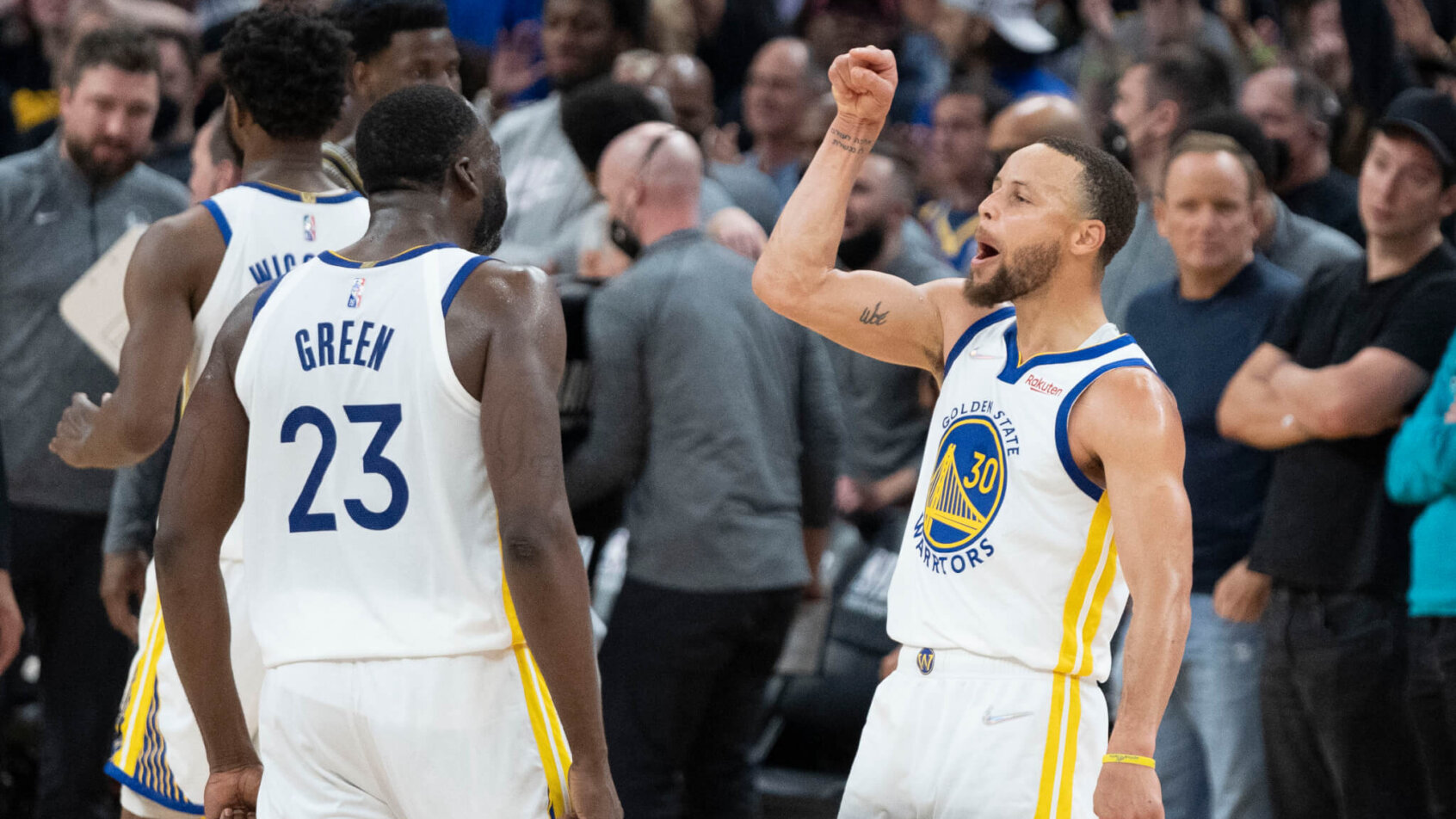 Steph Curry and Draymond Green celebrating during fourth quarter