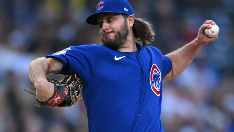 Chicago Cubs starting pitcher Wade Miley throwing a pitch