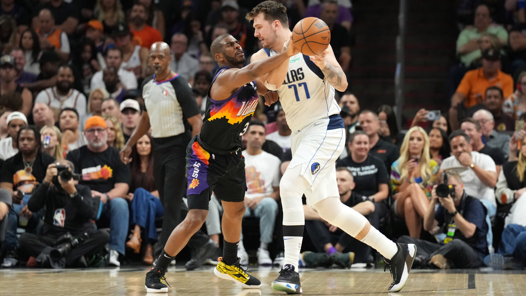 Luka Doncic defended by Chris Paul