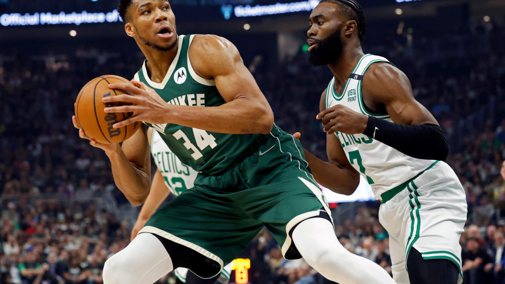 Giannis Antetokounmpo defended by Jaylen Brown