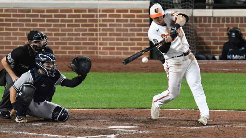Baltimore Orioles left fielder Austin Hays swinging the bat
