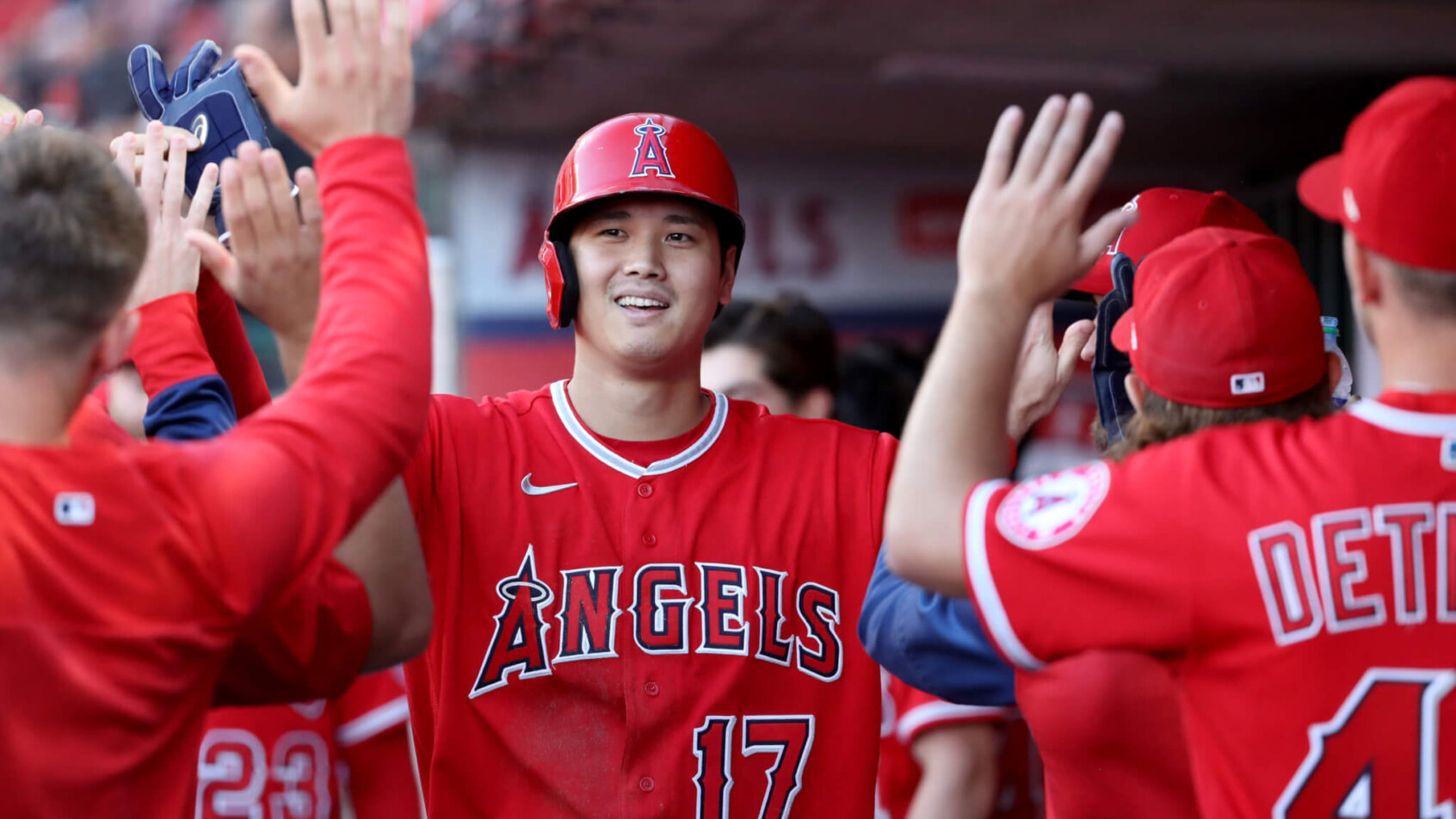 Shohei Ohtani dugout high fives