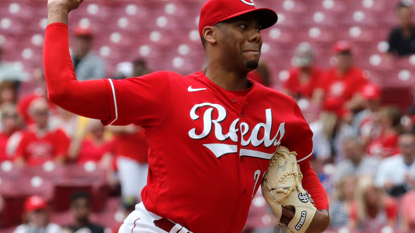 Cincinnati Reds starting pitcher Hunter Greene mid-pitch.