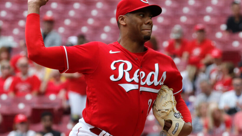 Cincinnati Reds starting pitcher Hunter Greene mid-pitch.