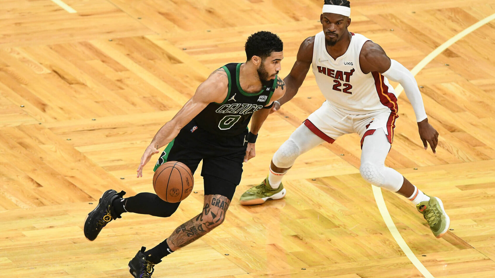 Jayson Tatum defended by Jimmy Butler
