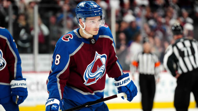 Colorado Avalanche defenseman Cale Makar skating back to the bench
