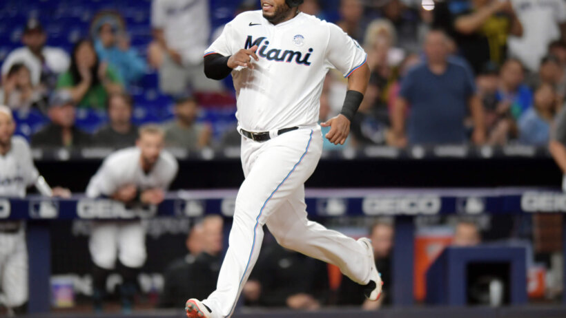 Miami Marlins first baseman Jesus Aguilar crossing home plate