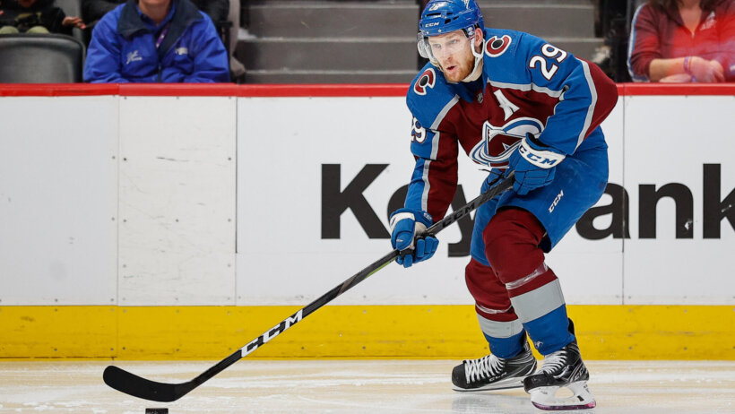 Colorado Avalanche center Nathan MacKinnon carrying the puck