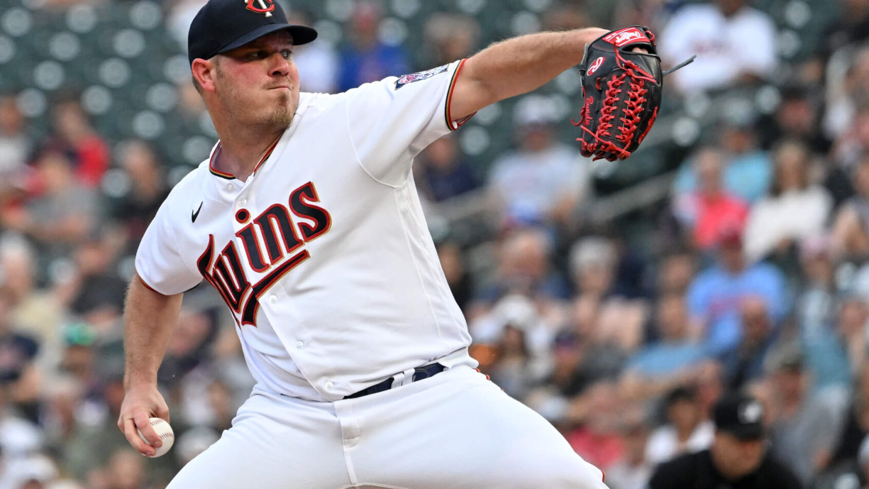 Minnesota Twins pitcher Dylan Bundy throwing a pitch during a game.