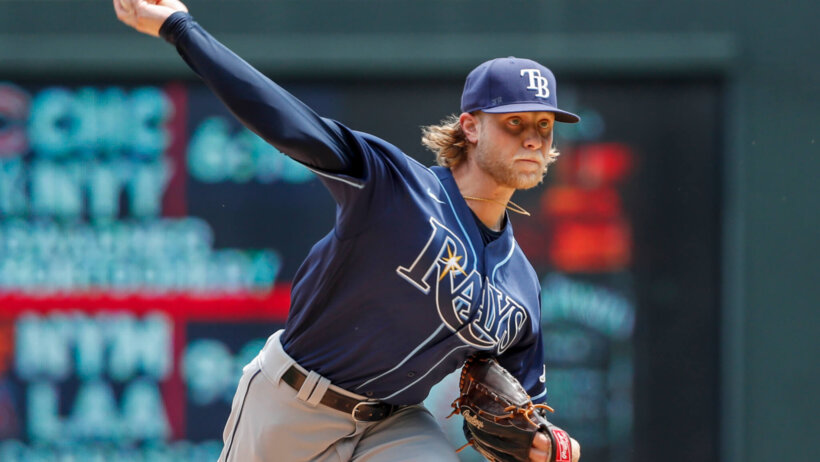 Tampa Bay Rays starting pitcher Shane Baz delivering a pitch
