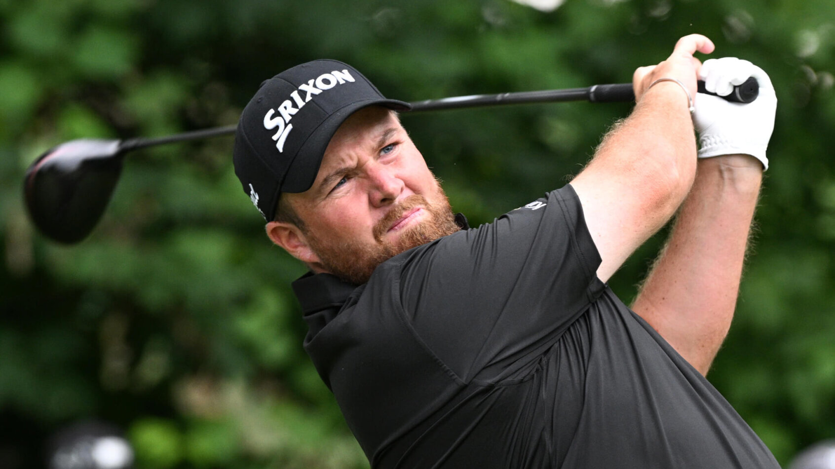Shane Lowry admires a tee shot