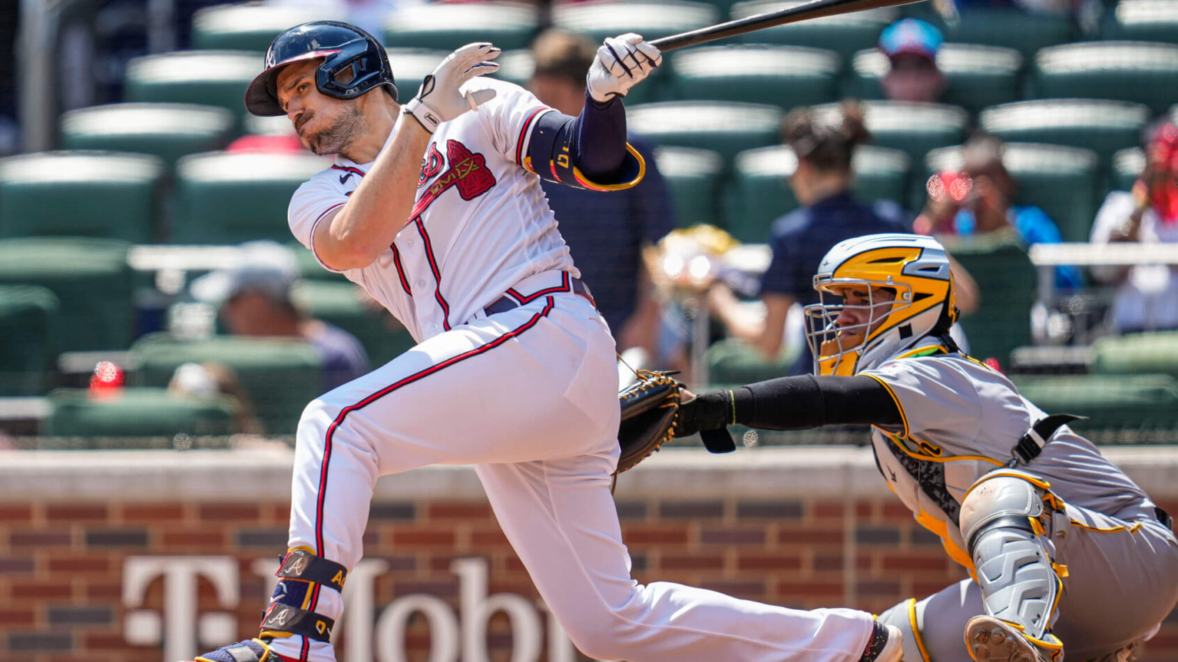 Atlanta Braves left fielder Adam Duvall swinging at a pitch