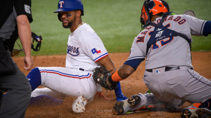 Leody Taveras beats the throw to the plate