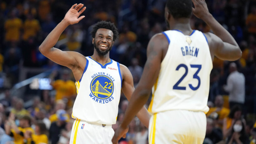 Andrew Wiggins hi-five with Draymond Green