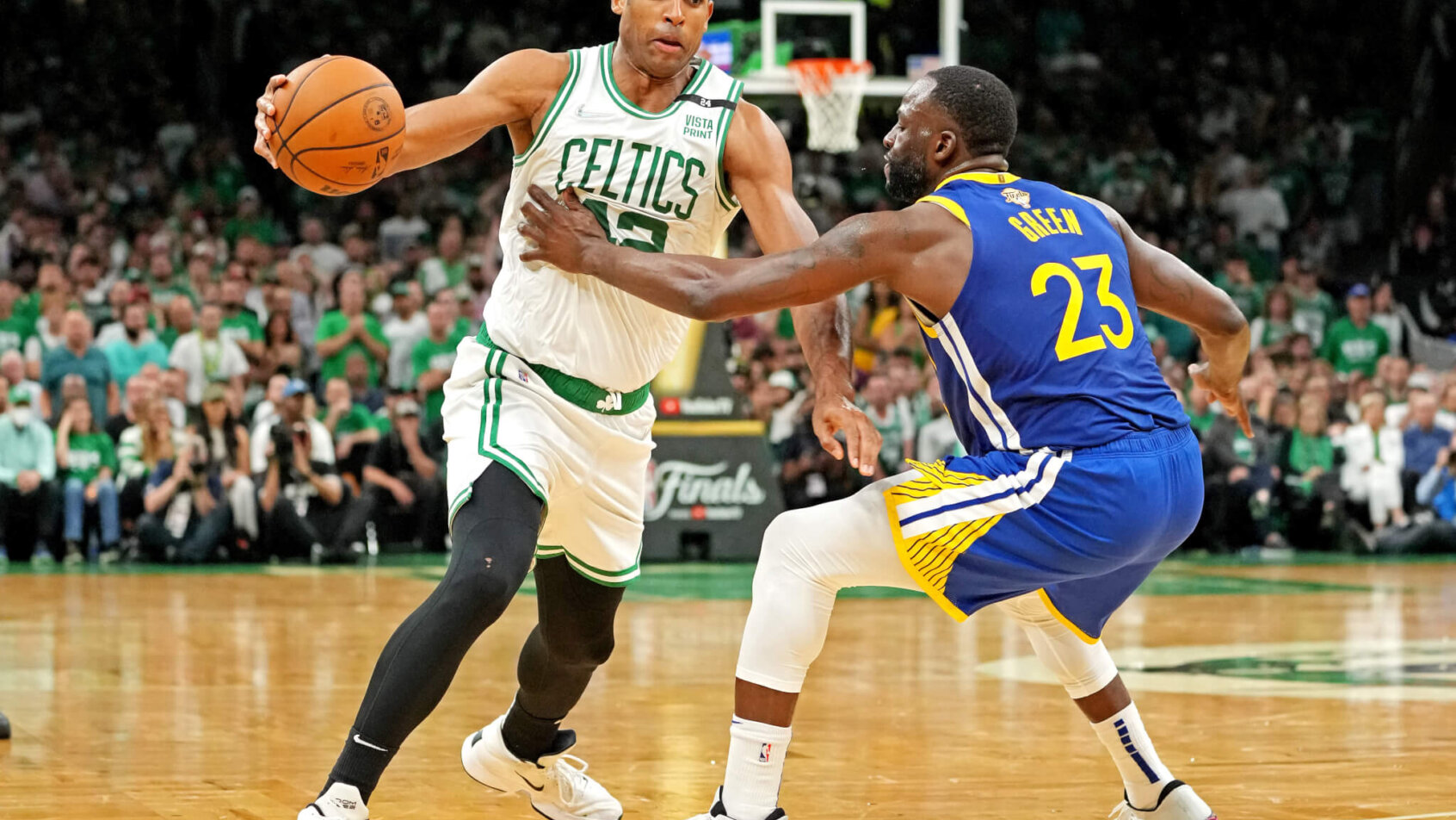 Al Horford drives against Draymond Green during the NBA Finals.