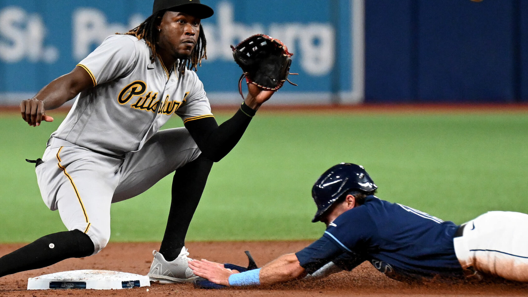 Josh Lowe slides into second safely