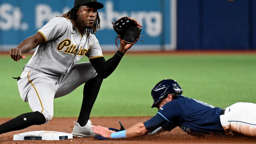 Josh Lowe slides into second safely