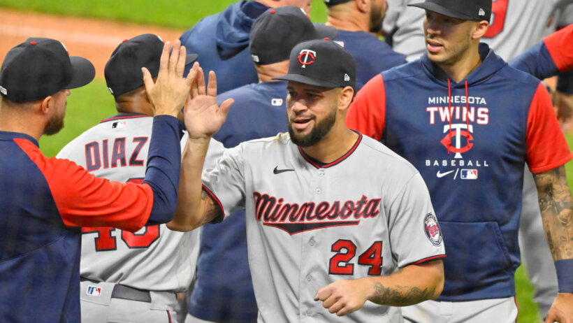 Gary Sanchez high-fiving Twins teammates