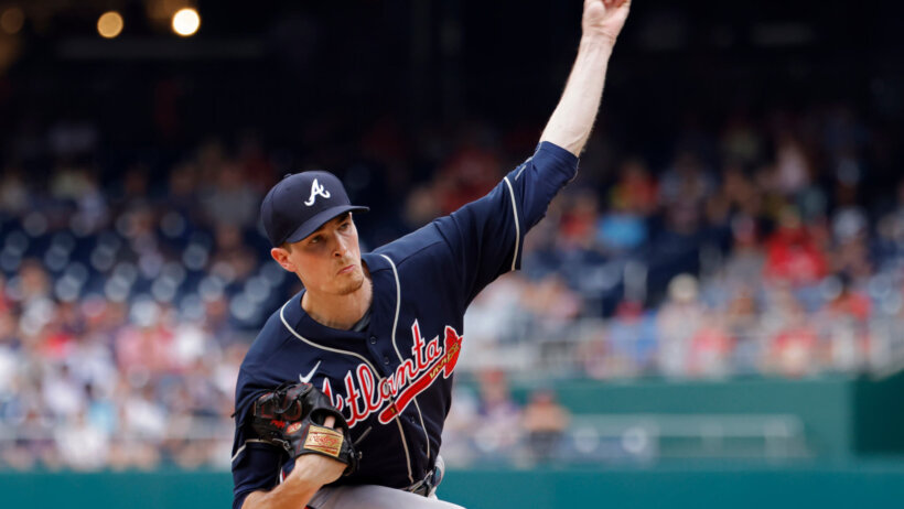 Atlanta Braves pitcher Max Friend throwing a pitch during the game.