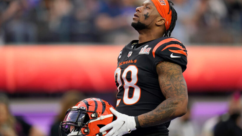 Joe Mixon holding helmet