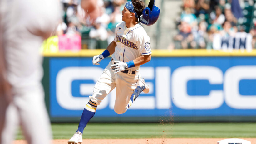 Seattle Mariners right fielder Sam Haggerty running around second base