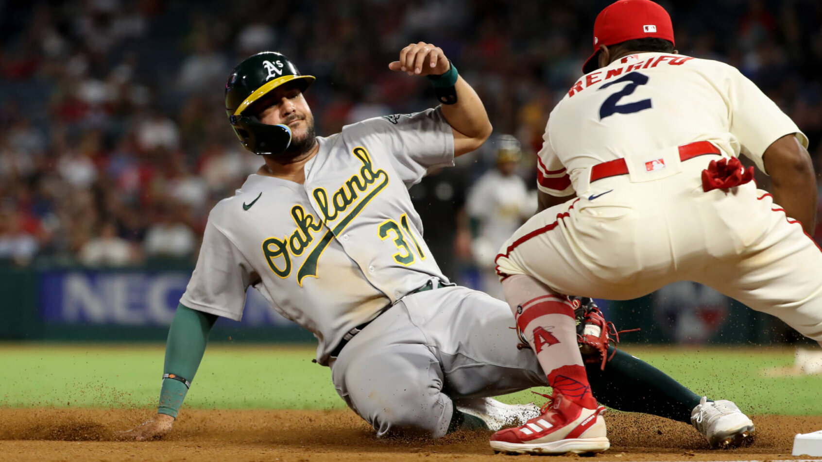 Oakland Athletics third baseman Vimael Machin tagged out at third by Angels third baseman Luis Rengifo