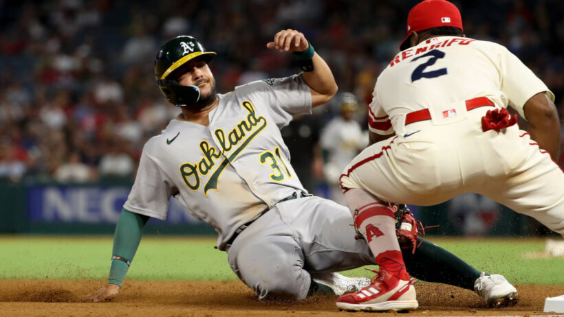 Oakland Athletics third baseman Vimael Machin tagged out at third by Angels third baseman Luis Rengifo
