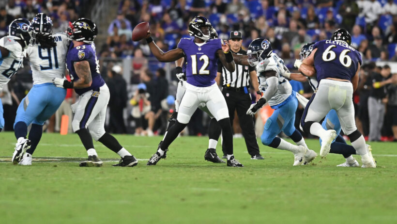 Anthony Brown throws a pass versus the Titans