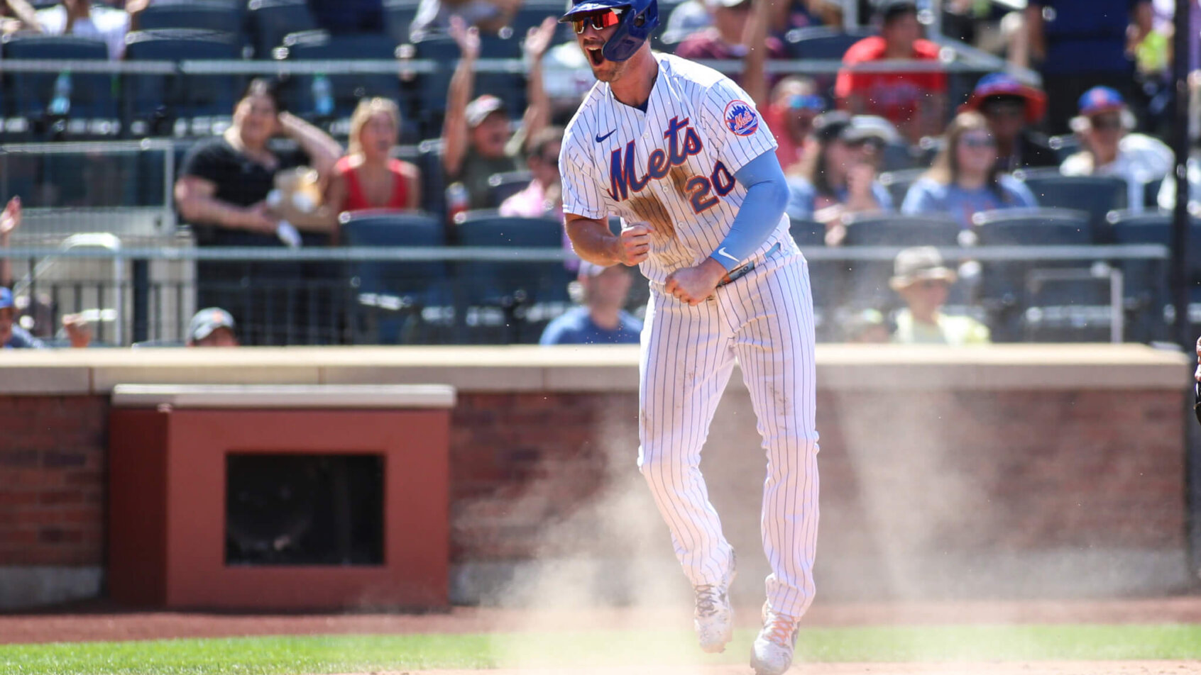 Mets first baseman Pete Alonso celebrating scoring a run