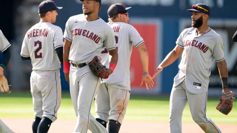 Cleveland Guardians players celebrate a win
