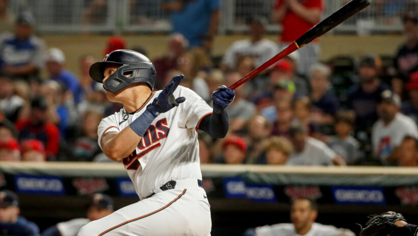 Minnesota Twins third baseman Gio Urshela hitting a single