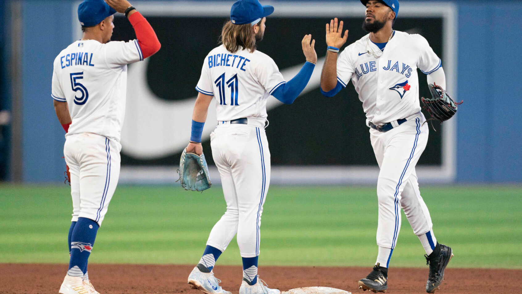 Blue Jays players celebrate after a win.