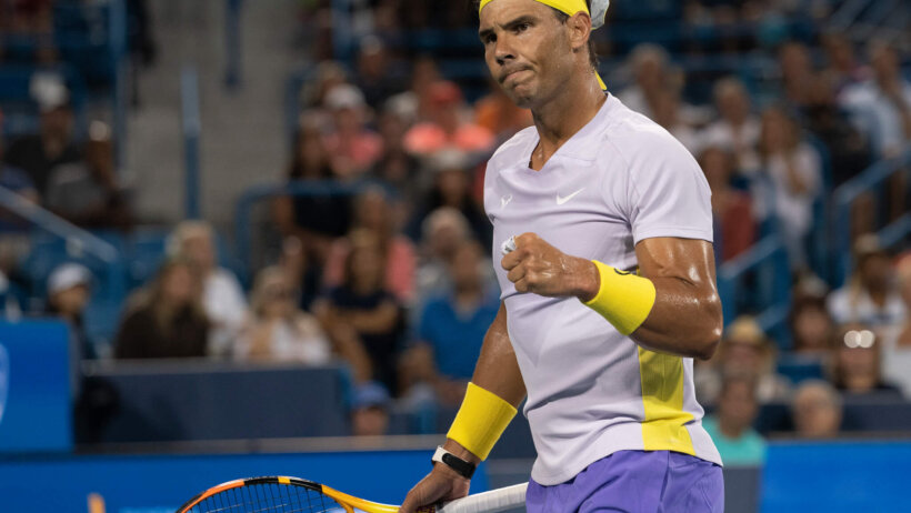 Rafael Nadal reacting to winning a point during a match.