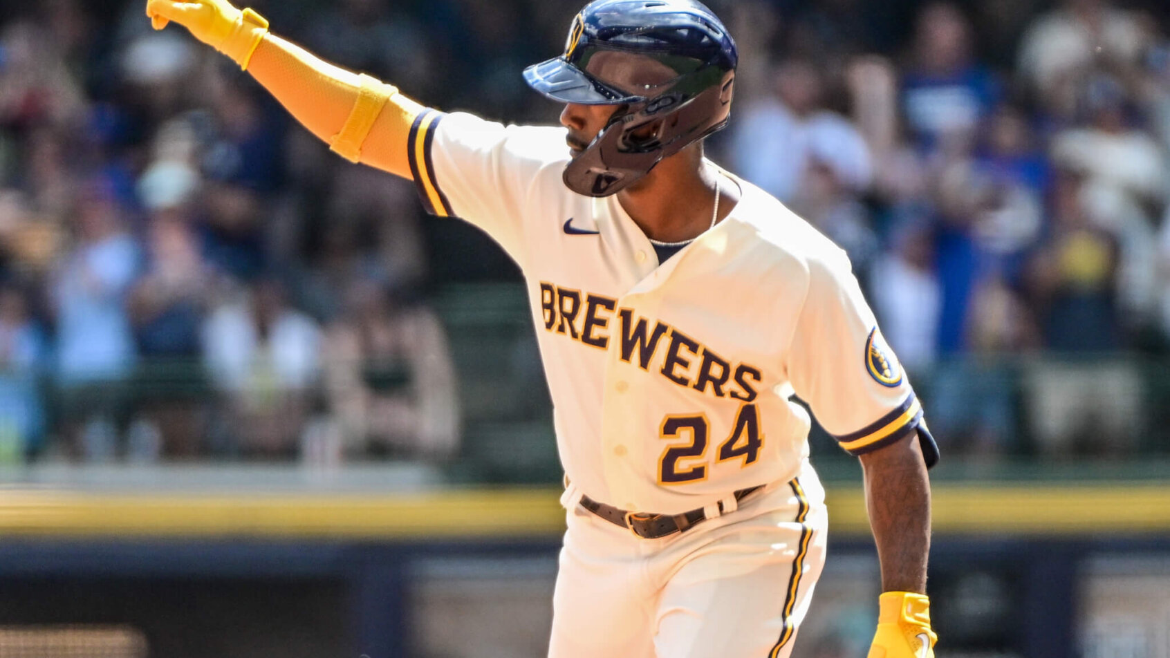 Milwaukee Brewers left fielder Andrew McCutchen celebrating a home run