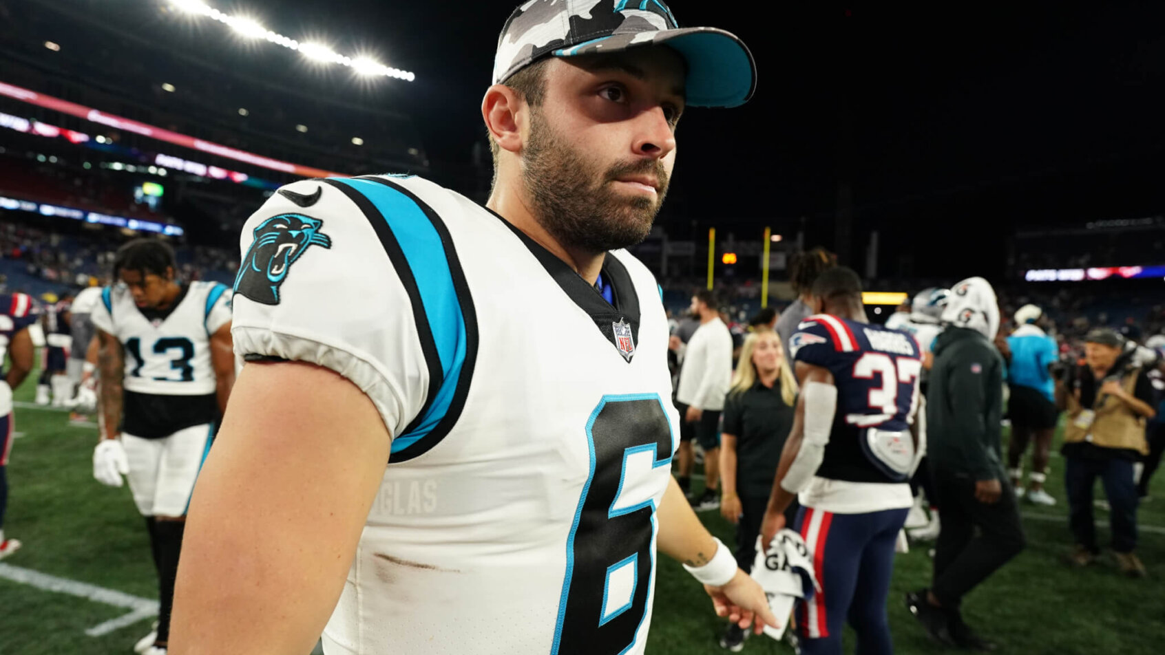 Carolina Panthers quarterback Baker Mayfield exits the field after the game against the New England Patriots