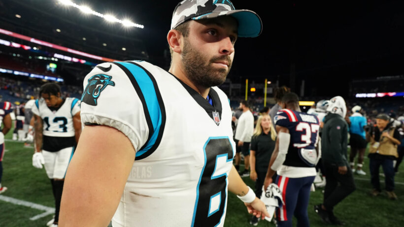 Carolina Panthers quarterback Baker Mayfield exits the field after the game against the New England Patriots