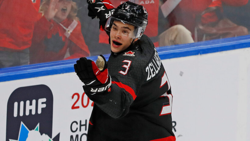 Team Canada defensemen Olen Zellweger celebrates a goal