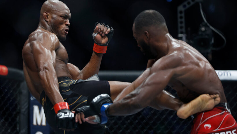 Kamaru Usman kicking Leon Edwards