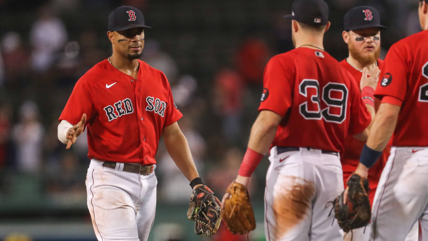 Boston Red Sox players celebrating a win