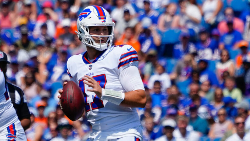 Josh Allen drops back to pass