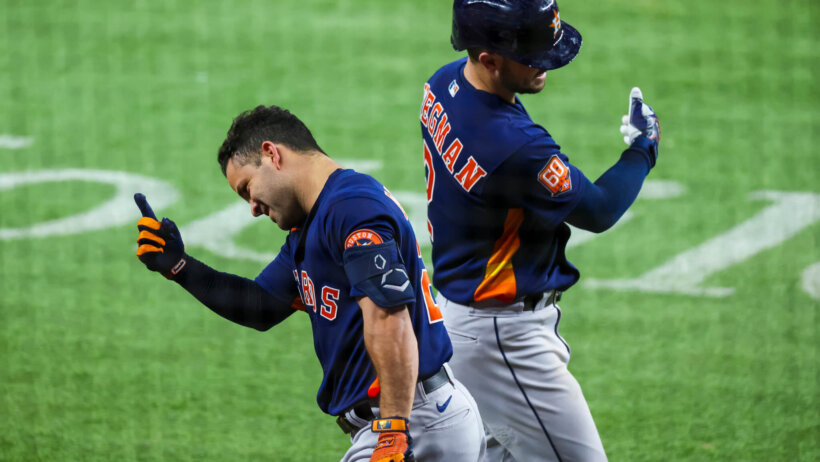 Jose Altuve celebrates with Alex Bregman