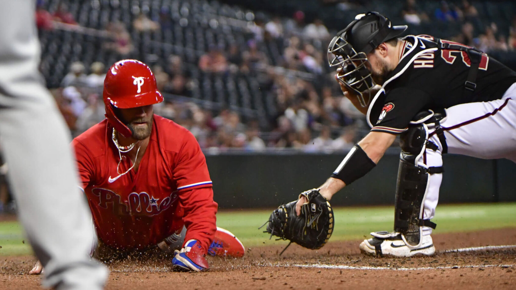 Bryce Harper slides home safely