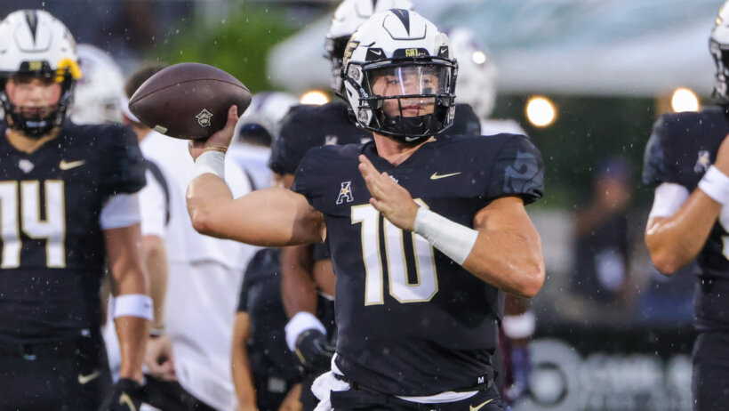 UCF Knights quarterback John Rhys Plumlee warms up