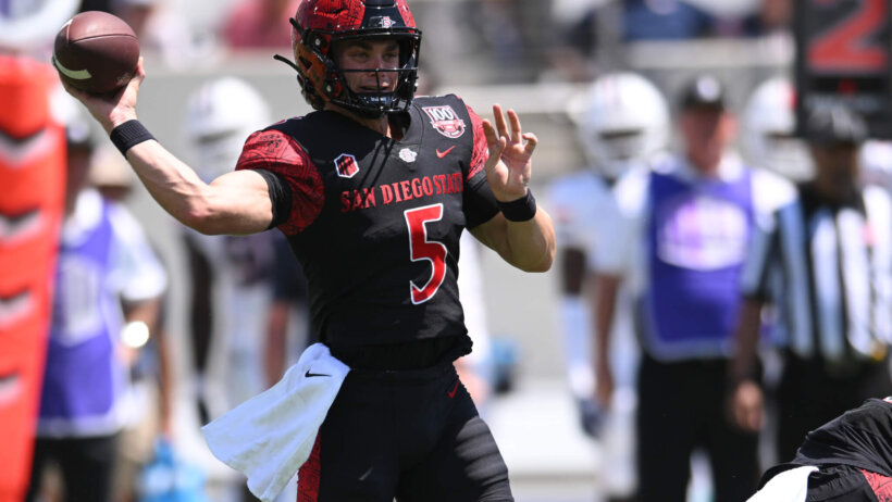 Braxton Burmeister throws pass