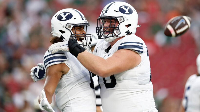 BYU Cougars wide receiver Keanu Hill celebrates a touchdown with his teammates