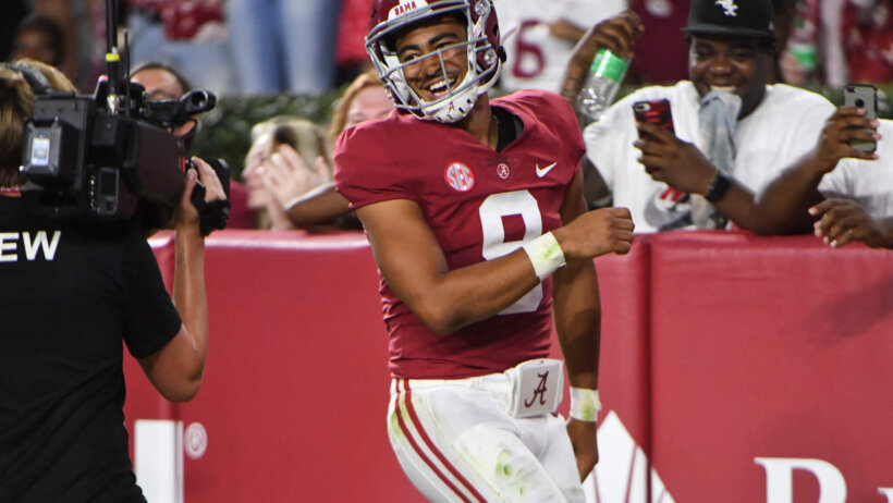 Alabama Crimson Tide quarterback Bryce Young celebrates after scoring a touchdown
