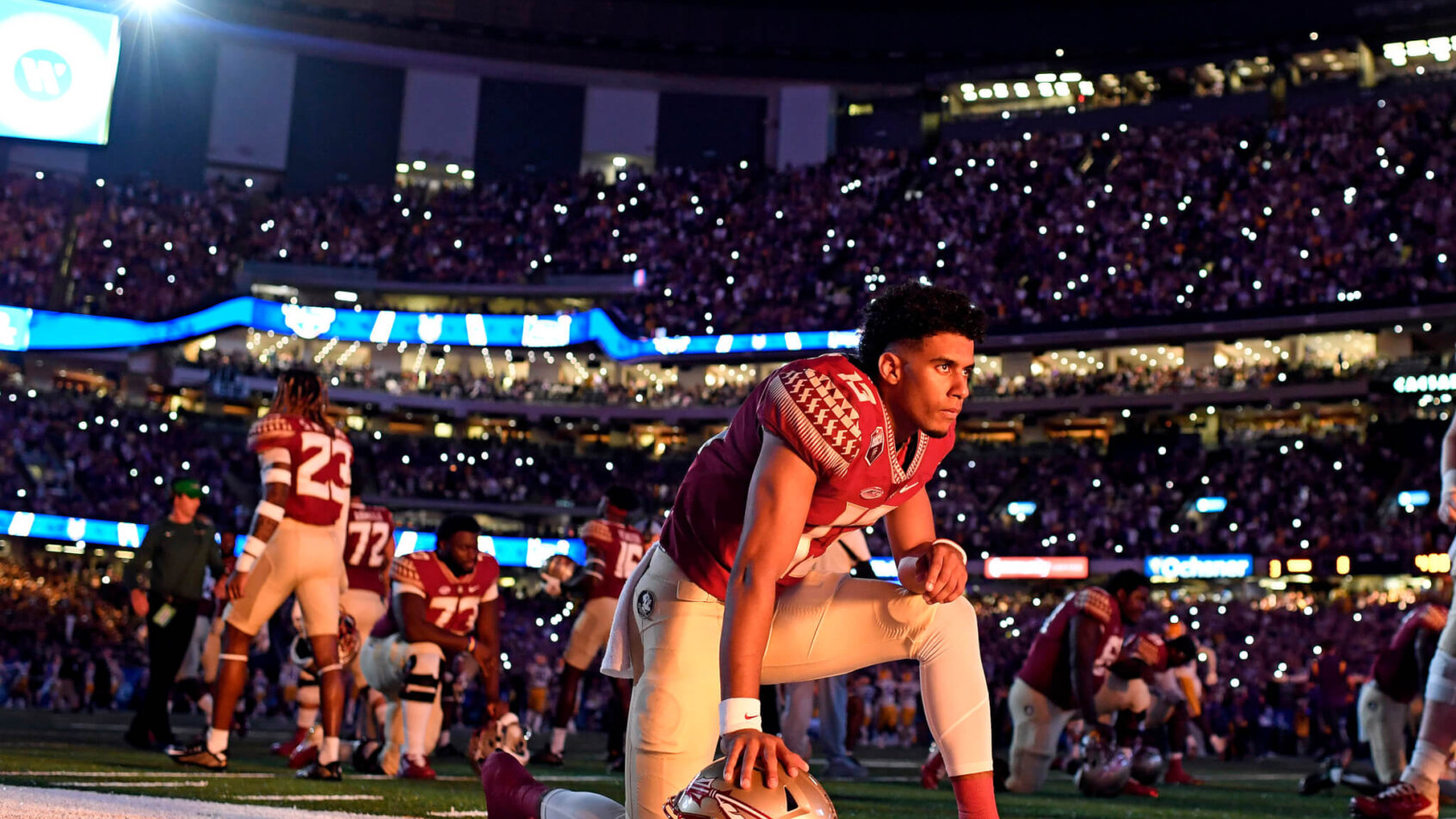 Jordan Travis stretching pregame