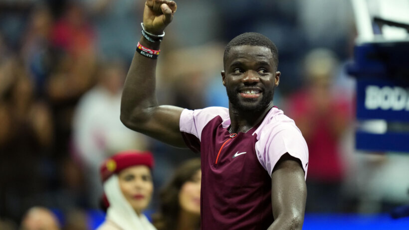 Frances Tiafoe celebrating with a fist pump